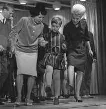 Dancing in the 1960s. The dance Hully Gully is being made popular and here are men and women