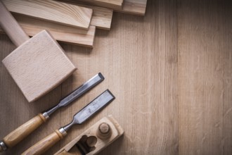 Variation of wooden joiner??™s working tools on wood board construction concept