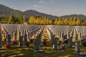 Daejeon, South Korea, October 27, 2019: War memorial and hercules missile above trees in fall