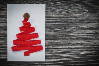 Christmas greeting card on wooden board