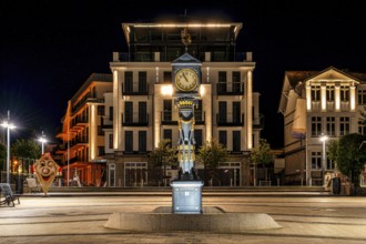 A view of the historic clock in Ahlbeck on the Baltic Sea at night on the island of Usedom
