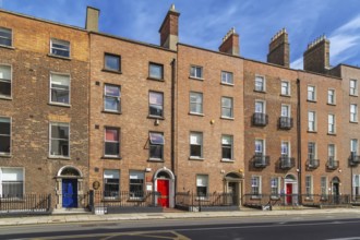 Street with typical houses in Dublin, Ireland, Europe