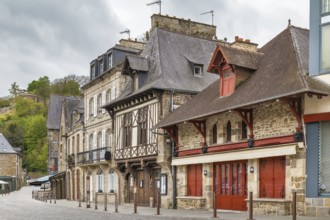 Street with half-timbered houses in Dinan city center, Brittany, France, Europe