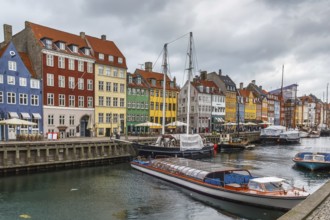 Nyhavn is a 17th-century waterfront, canal and entertainment district in Copenhagen, Denmark,