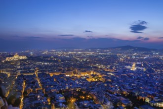 Amazing View on y Athens at magical blue hour (Acropolis of Athes at left corner) . View from