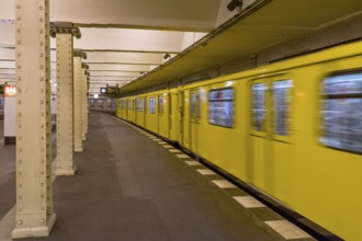 A train is passing by a metro station in Berlin, Germany, Europe