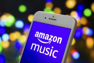 Calgary, Alberta. Canada May 22, 2020. An iPhone Plus with a Amazon Music logo on the screen