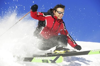 Skier in action, rapid descent on a slope, 30-40years, Alps, Austria, Europe