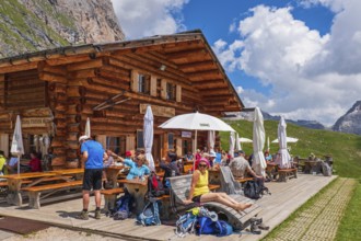 Restaurant with hikers in the Alps