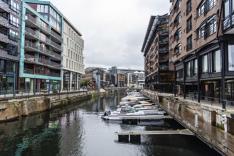 Oslo, Norway, August 10, 2019: New residential luxury buildings in Aker Brygge area a rainy day of