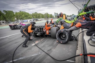 SANTINO FERRUCCI (14) of Woodbury, Connecticut comes down pit road for service during the XPEL