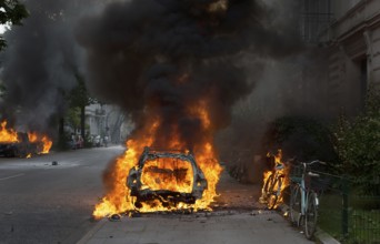 Burning car on the Elbchaussee at the G20 summit in Hamburg, 2017