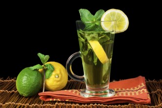 Cup of mint tea. Mint tea with lemon and fresh mint
