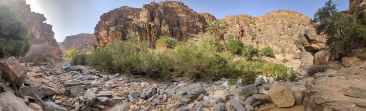 Hiking through the iconic Amtoudi canyon in the Anti-Atlas, Morocco, Africa