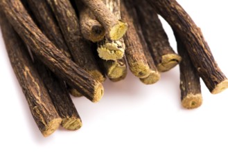 Licorice roots on white background
