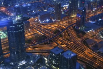 Dubai road junction view from above at a night, UAE