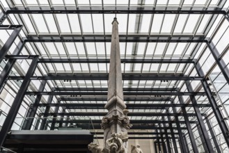 Ljubljana, Slovenia, 04 07 2018: Fountain, column and glass and steel construction at the National