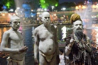 Naga sadhu standing near shipra river, madhya pradesh, india, asia