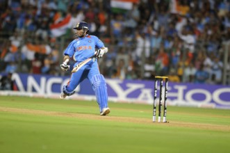 Batsman Sachin Tendulkar complete run 2011 ICC World Cup Final Sri Lanka Wankhede Stadium Mumbai
