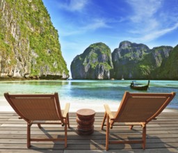 Charming lookout for two. Two convenient comfortable guest sun loungers and a bedside table are