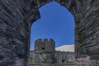 Conwy Castle, view through an arched opening in the castle wall to the tower of the medieval castle