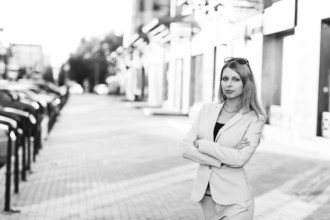 Portrait of an executive young woman posing outdoors