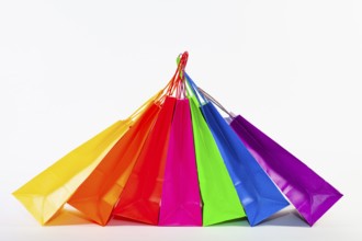 Set of colorful empty shopping bags isolated on the white background. Sale, consumerism,