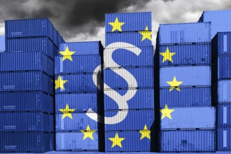 PHOTOMONTAGE, Stacked containers with EU flag and paragraph sign, symbolic photo supply chain law
