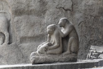 Stone sculpture of monkeys in an everyday scene, finely detailed, Mahabalipuram, Tamil Nadu, South