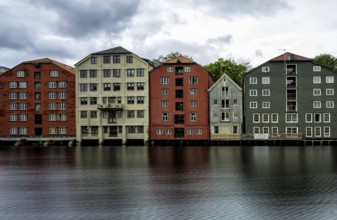 View of warehouses at the Nidelva river in Trondheim, Norway, Europe