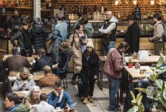Brussels Old Town, Brussels Capital Region, Belgium, 02 03 2020, Croweded bar and cafe tables at