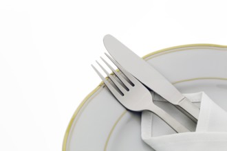 A knife with fork and plate. Place setting for a dinner in a restaurant. Austria