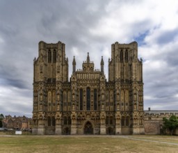 Wells, United Kingdom, 1 September, 2022: view of the two spires and front of the 12th-centruy