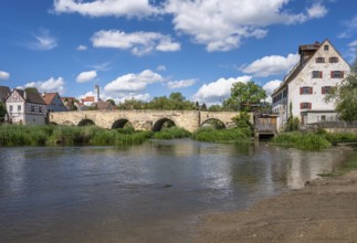 Historic bridge across the river Wörnitz at the city Harburg (Bavaria, Germnay)