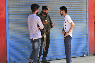 Army man during death anniversary of Hizbul Mujahideen, Kashmir, India, Asia