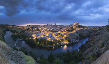 Panoramic view of Toledo after sunset, Spain, Europe