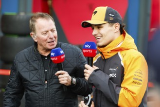 Lando Norris of Great Britain and McLaren Formula 1 Team chats to Martin Brundle after winning the