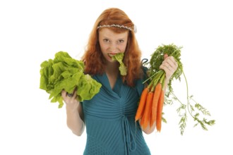 Young woman eating lettuce and carrots for diet isolated over white background