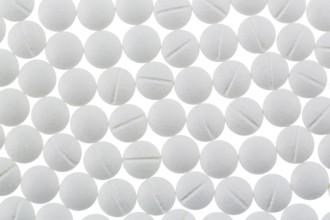 White tablets, symbolic photo for medicine, remedies and tablet addiction
