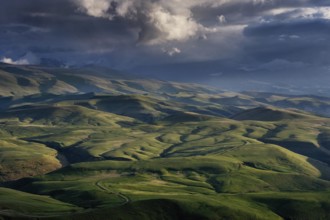 Beautiful landscape with hills in Caucasus mountains at sunset, Russia, Europe