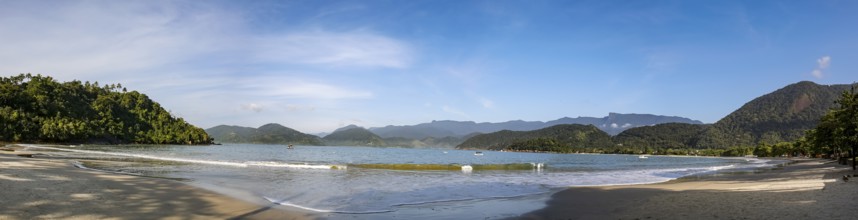 Panorama of wonderful Praia do Lazaro (Lazaro Beach) on a sunny day with rainforest mountains,