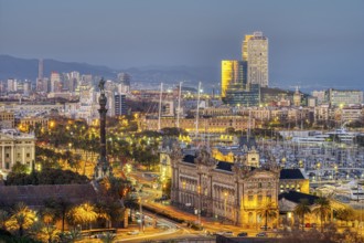 The Barcelona skyline with the Columbus statue at dusk