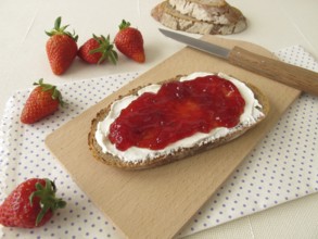 Bread with cream cheese and strawberry jam