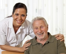 A carer caring for the elderly in a retirement home in Austria