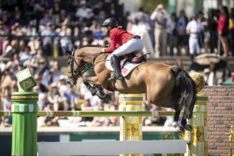 Jorne Sprehe of Germany and riding Sprehe Hot Easy compete in the first round of the 1.60m CPKC