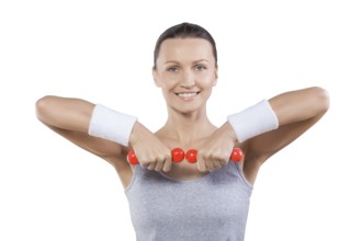 Close up portrait sport woman with little red dumbbells looking at camera smiling isolated