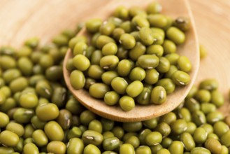 Mung beans over wooden spoon, lodz, poland