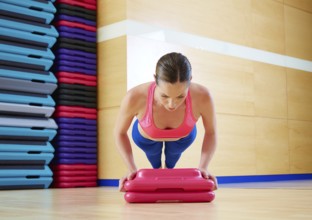 Push up push-ups woman exercise workout at gym indoor