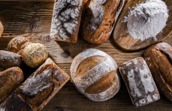 Composition with assorted bakery products on wooden table
