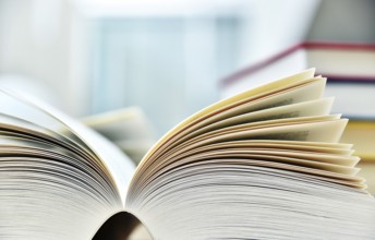Books lying on the table in the public library